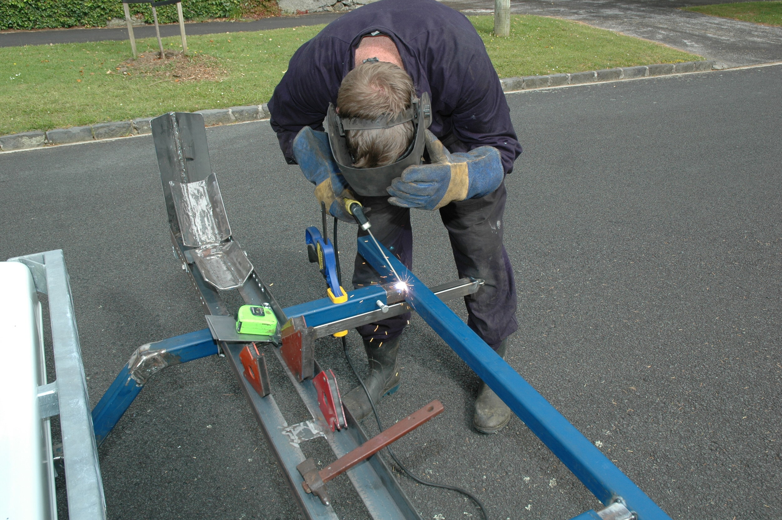 Tacking bumper bar on box section sliders