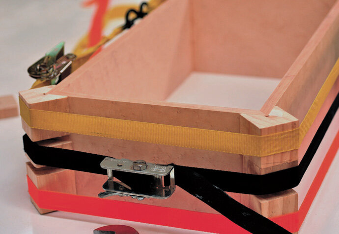 Band cramps with V blocks are the best way to clamp small carcase.