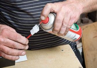 Protective silicone spray