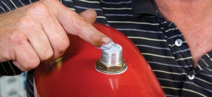 Sealing motor shaft end where ﬂag sits