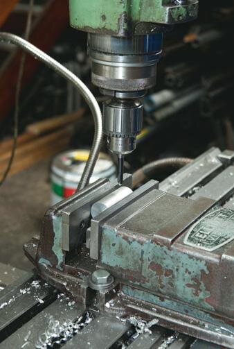 Cross-drilling trammel end