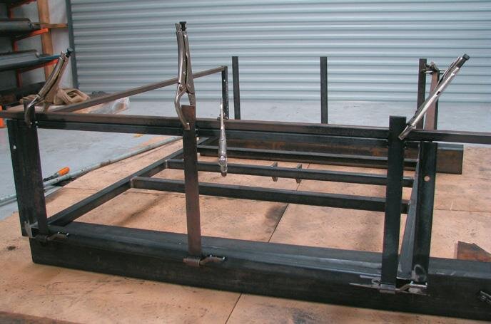 Mount hinges to top rail (tail gate)