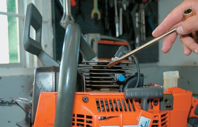 Checking between the cooling ﬁns for dirt and debris