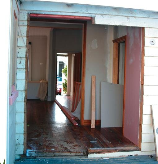 New opening. Note new 2/150 x 50 mm lintel beam visible at top of door opening.