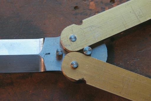 Check position of “blade open” pin